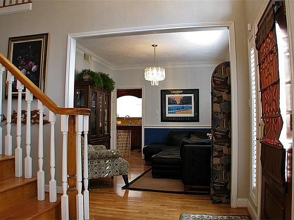 Looking across the entry foyer from the study to the formal dining room.
