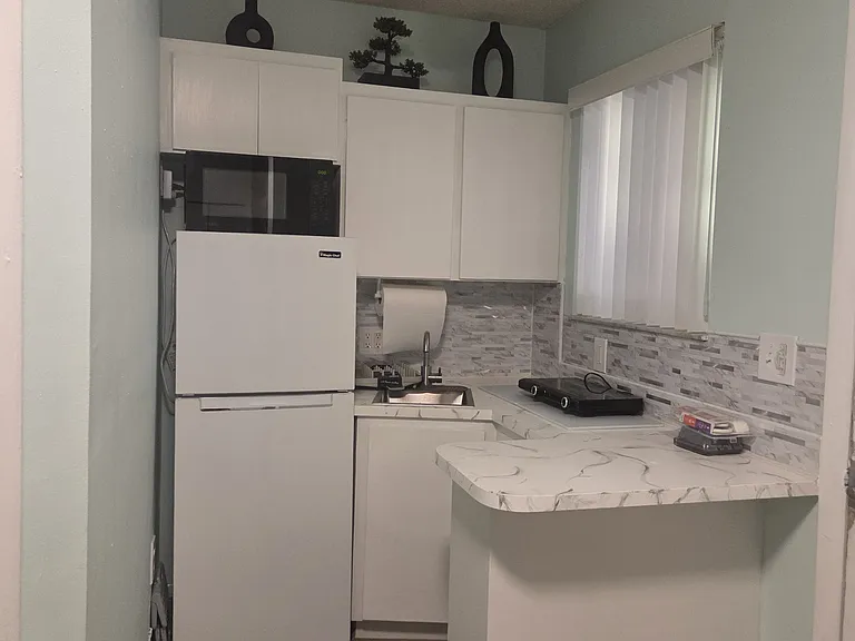 5690 W 9th Ln — Photo 14