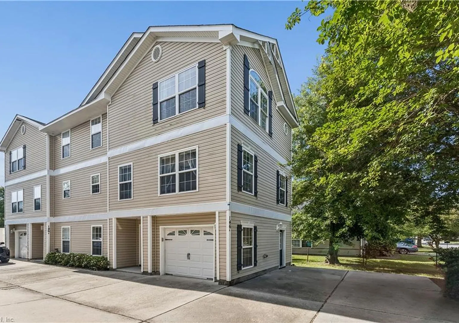 Spacious three-story townhouse-style condo in the heart of Virginia Beach! — Photo 1