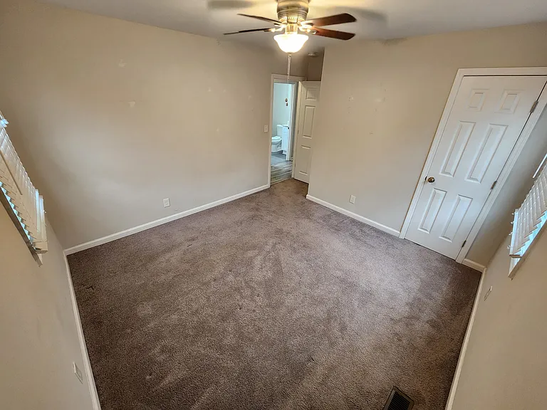 Front house - Bedroom 2 (NOTE: bedroom is now laminate floors, not carpet, as shown in first photo of Bedroom 2).