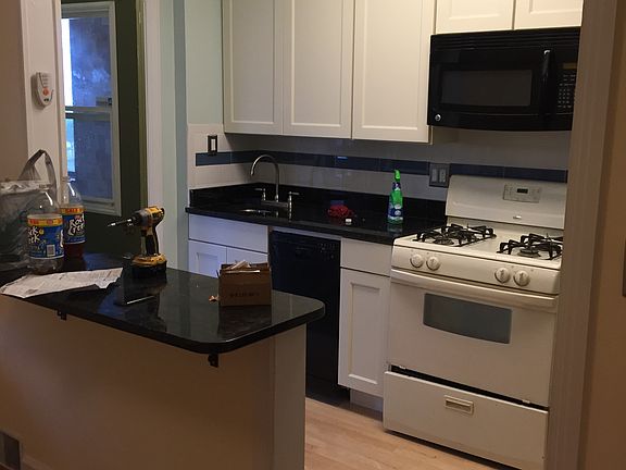 kitchen has microwave & dish washer