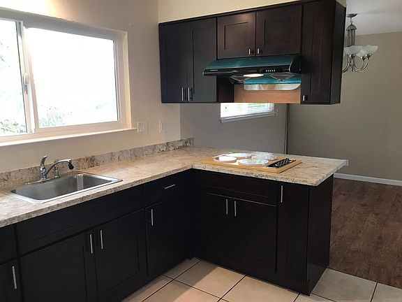 Remodeled Kitchen with new granite top, ventilation fan and 