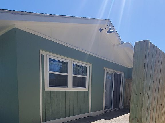 fenced outdoor patio space