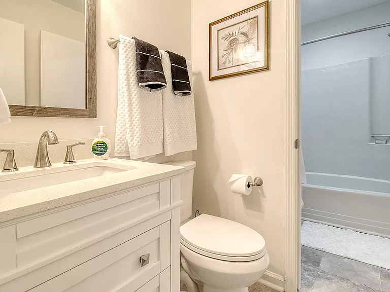 The half bath is convenient and well suited for your extra guests