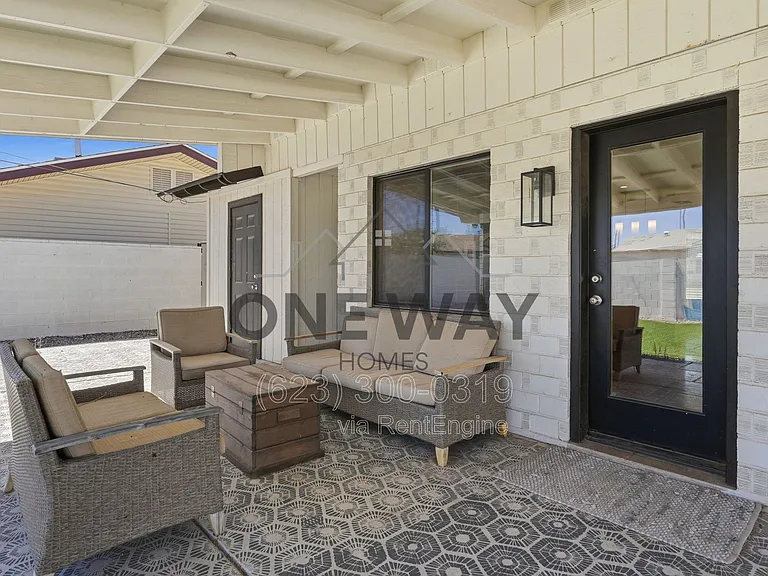 8702 E Sheridan St — Photo 22