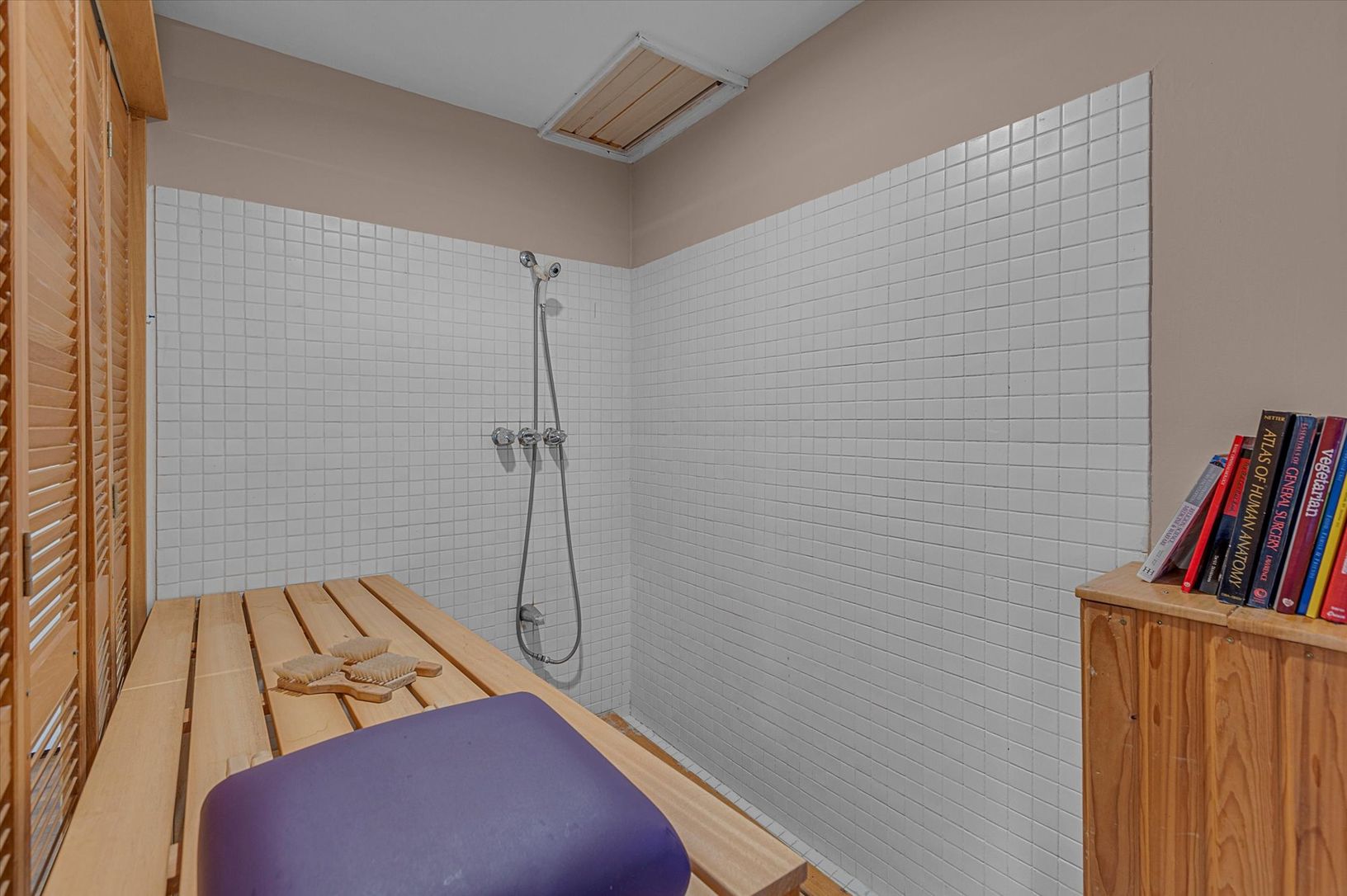  Shower and massage table in sauna room