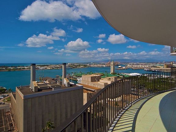 Your double lanai overlooks the ocean,Honolulu Harbor, and Aloha Tower
