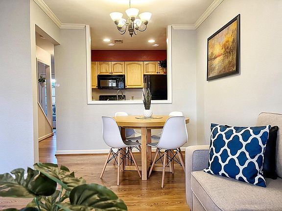 Living Room & Dining Area w/ 65" Smart TV