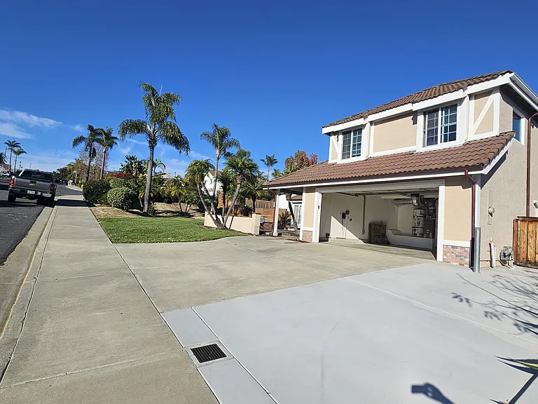 Side view of home and Parking for VAN or car.