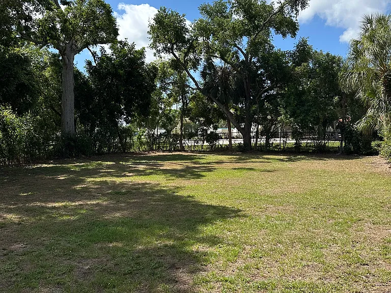Sits on just shy of half an acre. Lawn is mowed by company so no work on your part.