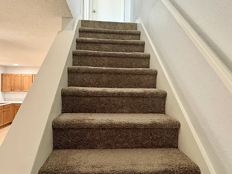 Stairs leading to the upstairs area