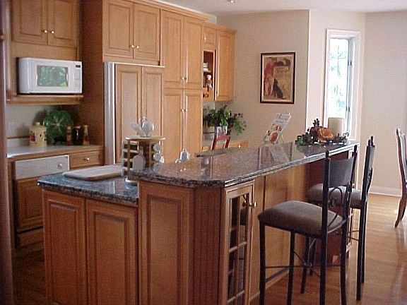 One of 2 Well Appointed Gourmet Kitchs