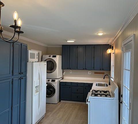 Renovated kitchen. Washing machine and dryer included.