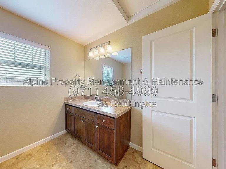 9495 NW Ember Ln — Photo 43
