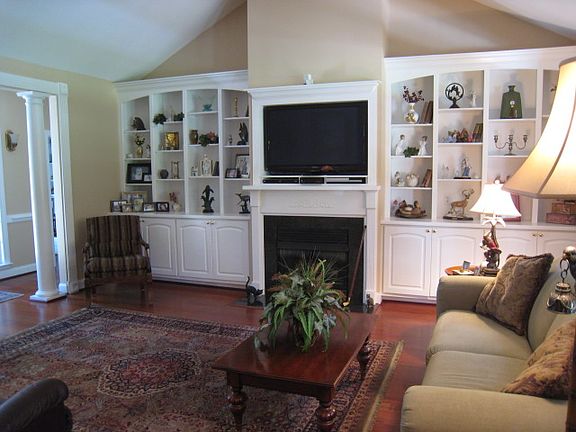 Built in cabinets and fireplace in great room