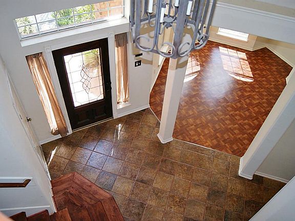 VIEW OF ENTRY FROM UPSTAIRS