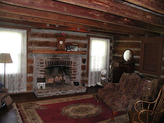 Originel log home and fire place inside main home built in 1790