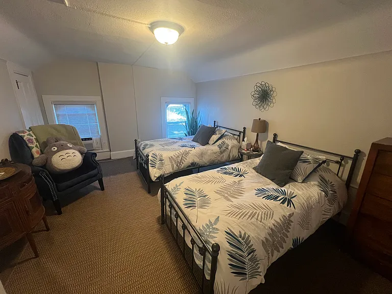 one of the 3rd floor bedrooms furnished. New white ceiling fan added since photo taken