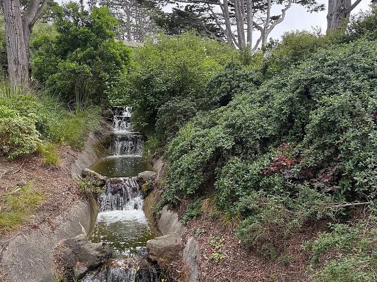The ambiance of the waterfall near the clubhouse