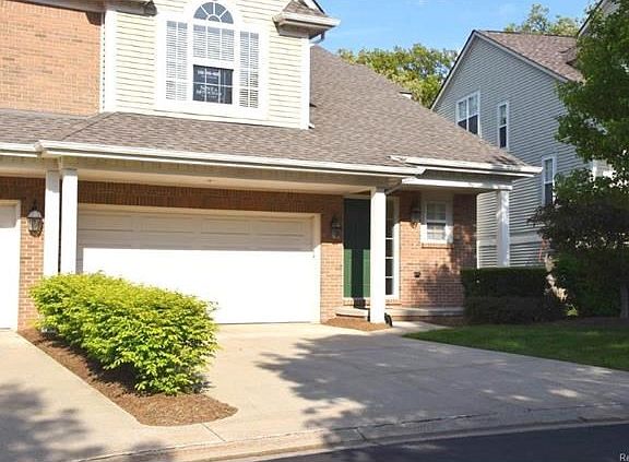 Nice sized driveway and covered porch detail