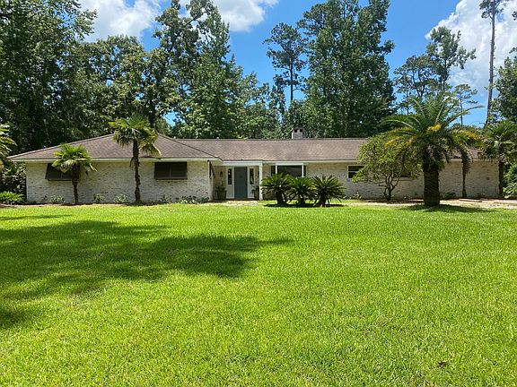 Front of house; large lot (not fenced) on a quiet street