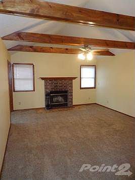 Beamed Greatroom with cozy Fireplace!