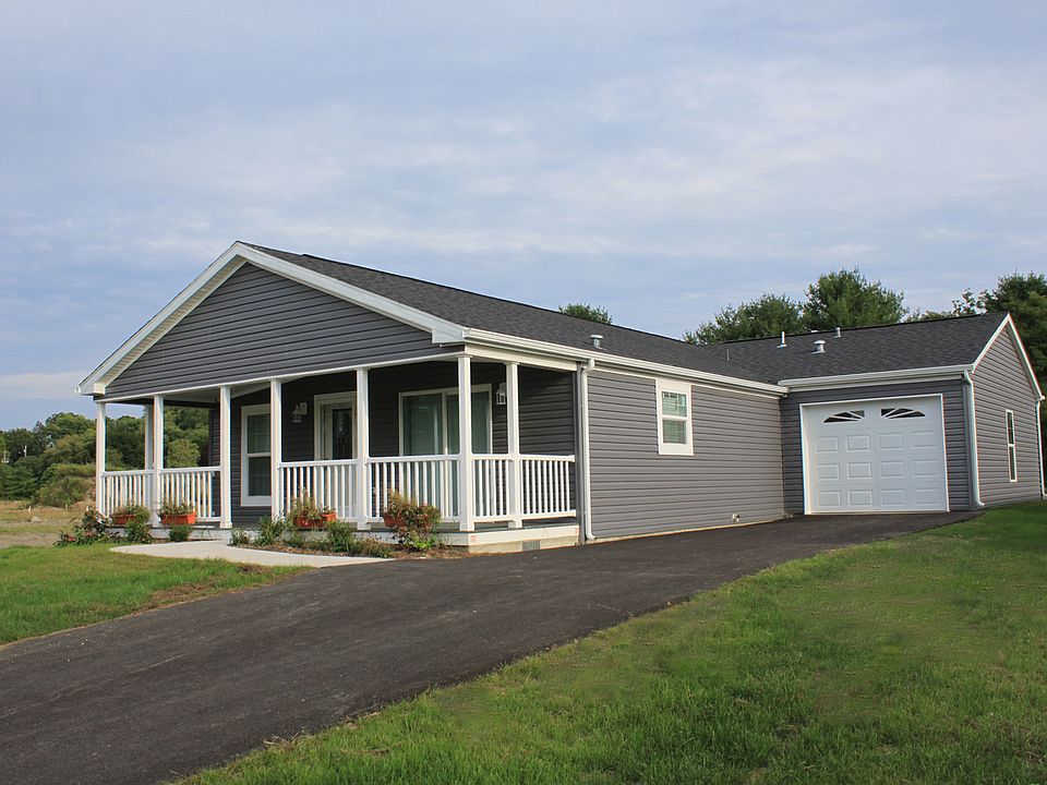 Empty Lot available to build this model. Garage optional