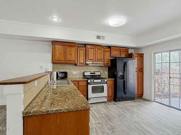 7235 Royal Arms Dr #E — Photo 14