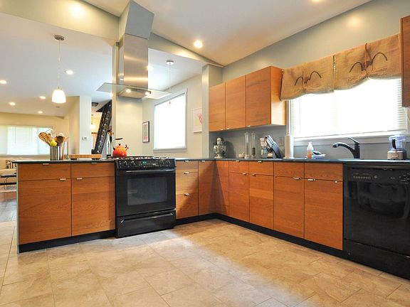 Kitchen has lots of storage, excellent vent hood, lazy susan corner cab, new gas range 5 months ago, new upgraded dishwasher last year.
