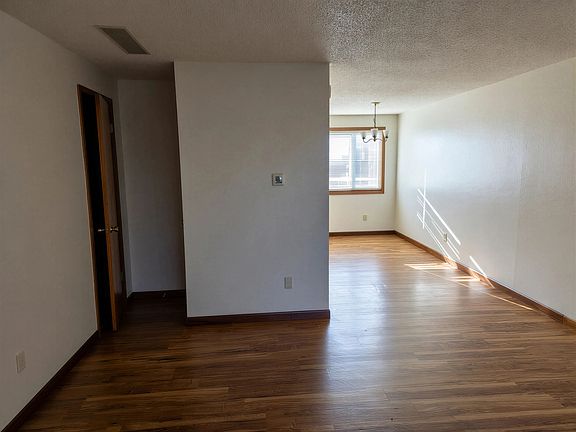 Unit #5 Living Room and Dining Room beyond