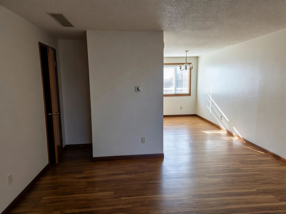 Unit #5 Living Room and Dining Room beyond