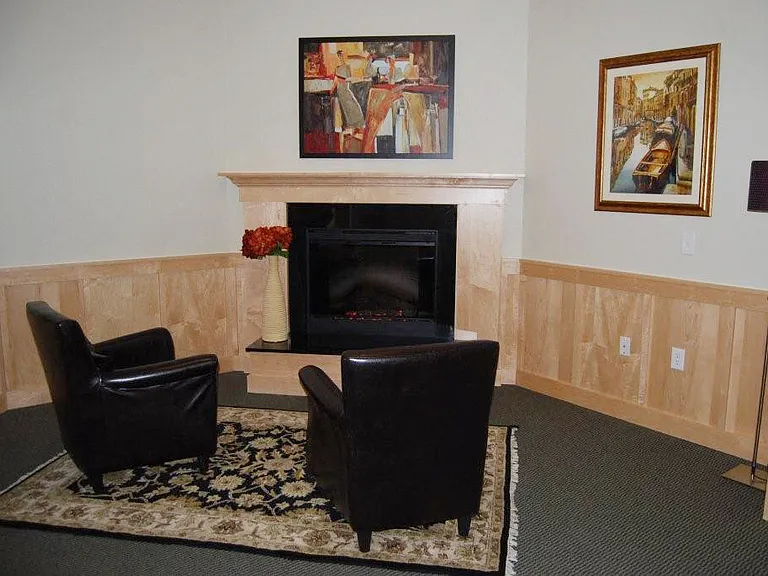 We have a cozy community room with a fireplace