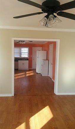 Living room looking into kitchen