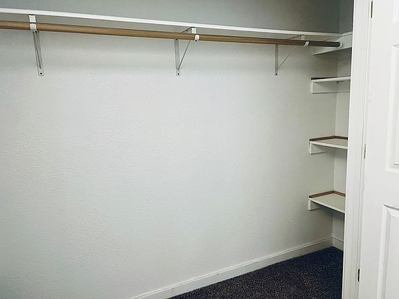 Large wardrobe with shelves on both sides
