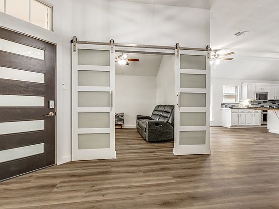 New sliding doors were added to give a updated look for this multi purpose den/office space.