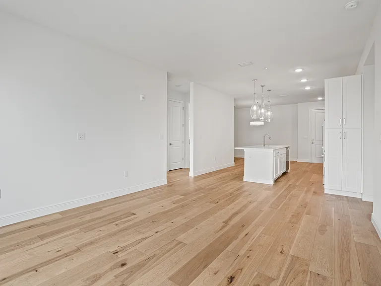 Open concept living, dining, and kitchen area, perfect for entertaining and everyday family living.