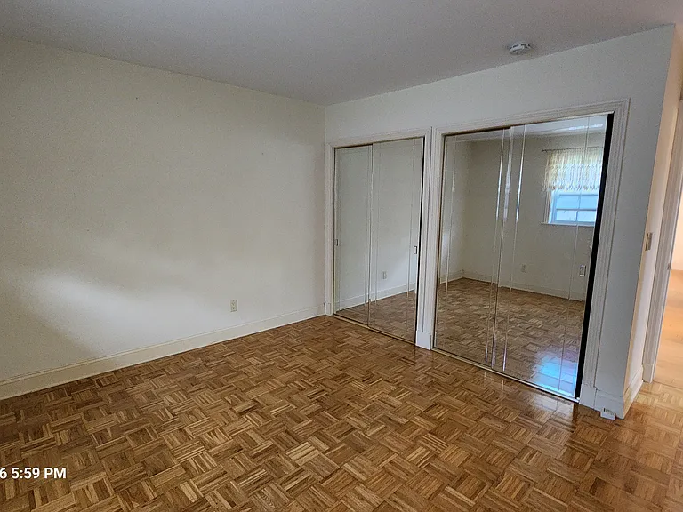 Bedroom # 2 with mirror closets