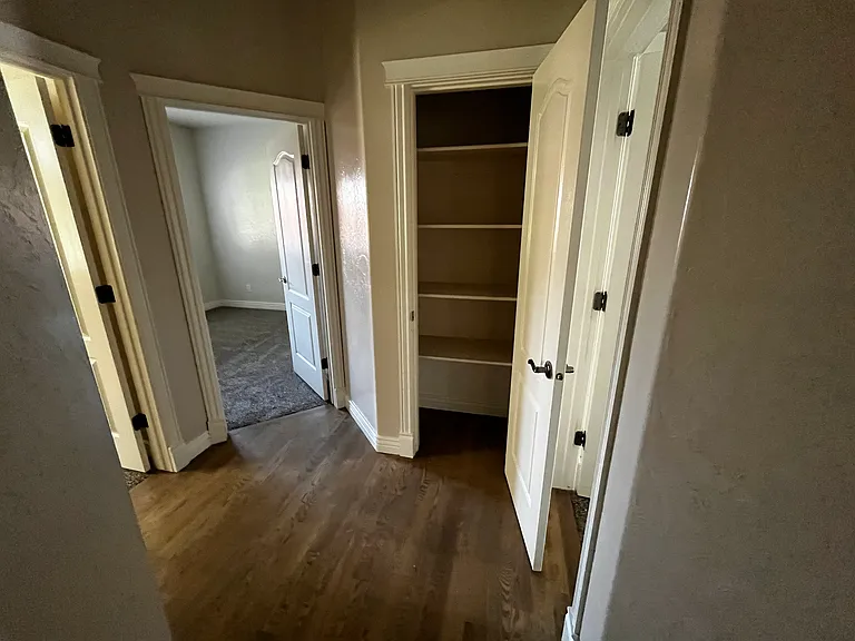 Hallway to access three bedrooms on main floor.