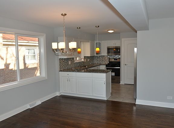 5th image of 10237 S 52nd Ave
