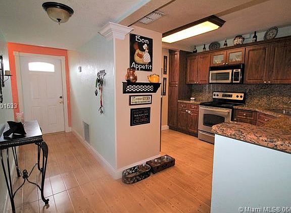 2nd image of 7360 W 18th Ave #0