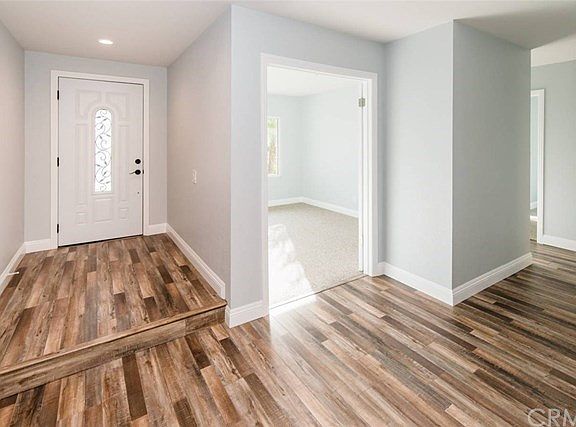New EVERYTHING in this home. New front door, new flooring, new carpeting.