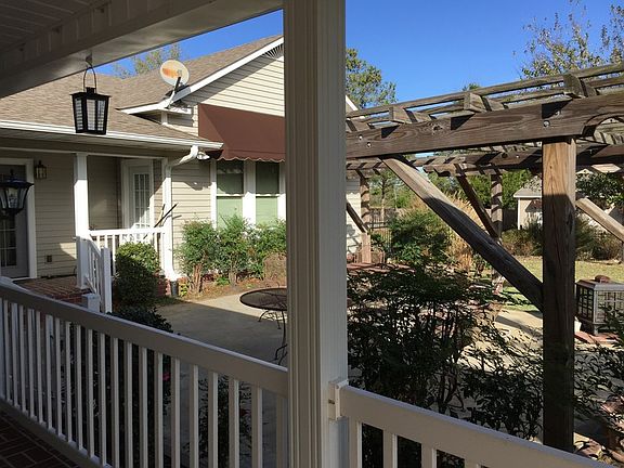 View of Patio : Wrap-around porch leads to patio. Perfect for backyard bar-b-cues!