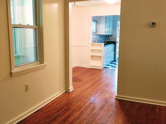 view from the living room to dining room and kitchen.