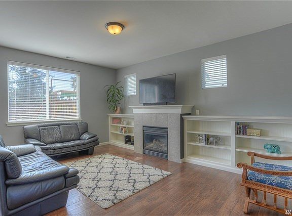 Gas fireplace with built-ins. Great storage for your books and collectibles!