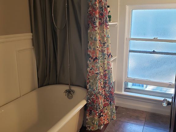 upstairs bathroom, with professionally refinished clawfoot tub (and shower)