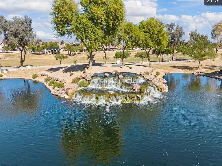 The Lake with waterfall steps away and walking trails