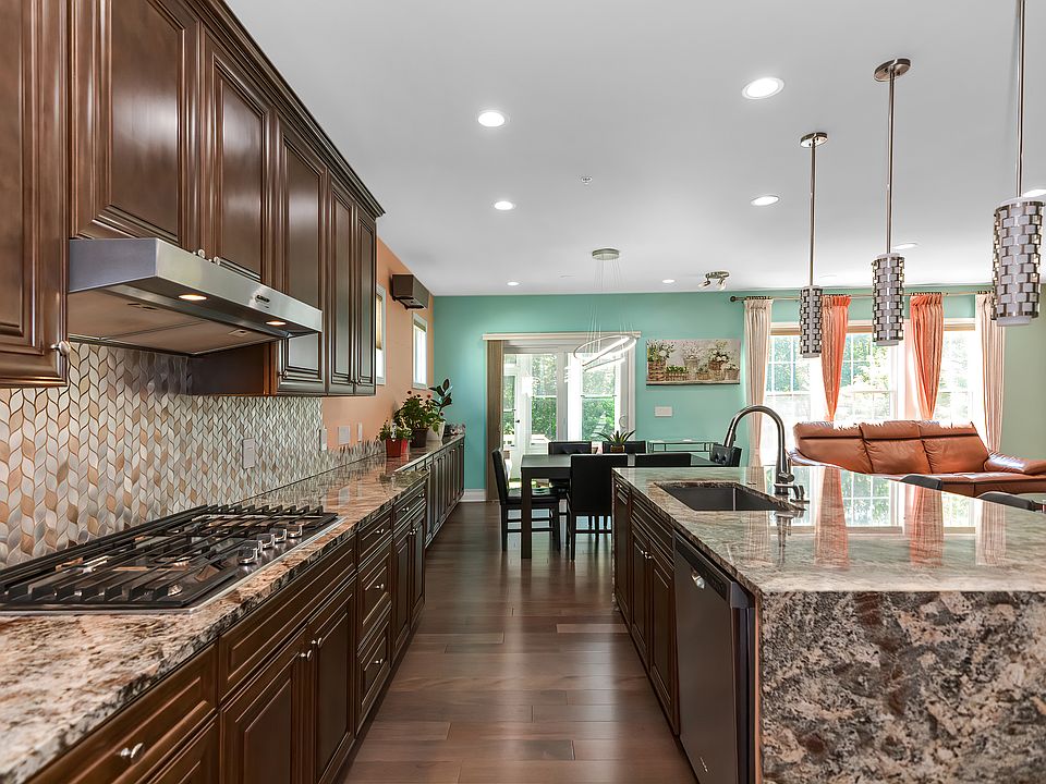 Gourmet kitchen with multiple upgrades.
