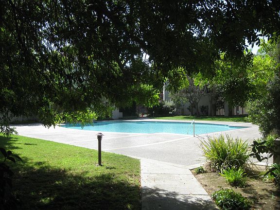 Swimming pool with spa area
