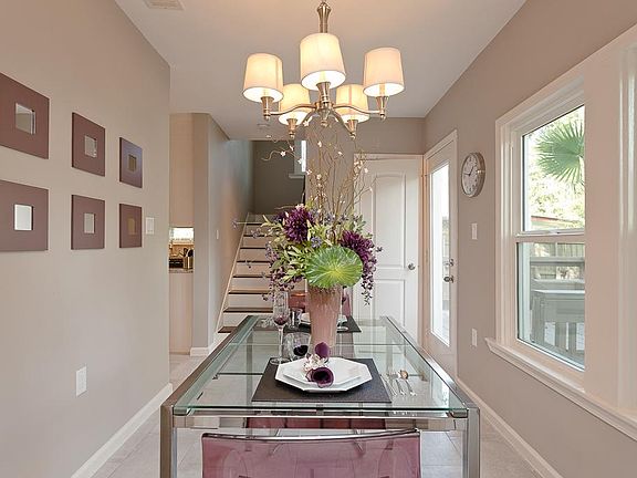 Stair case leading to your master suit and recently added half bath to accommodate your guests at the bottom of the stairs!