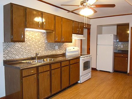 Custom glass back splash in kitchen and bathroom